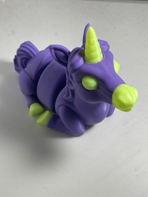 Laying Unicorn figurine