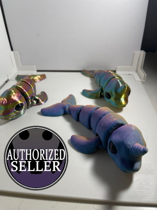 Narwhal articulating figurine in multi-color design