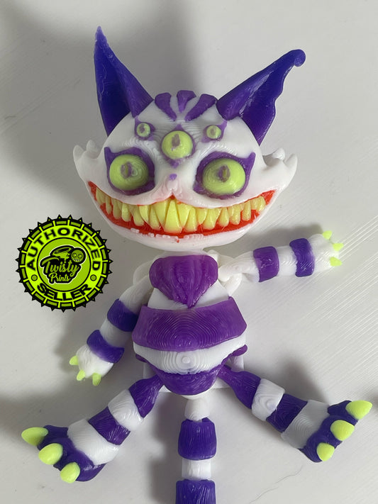 Creepy Cheshire cat figurine